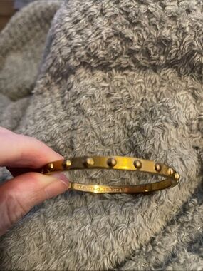 Vintage Kate Spade New York gold tone bangle FIRM